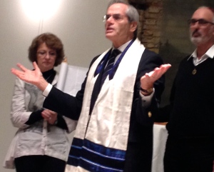 Explaining the Torah portion. We read from a replica Torah scroll held up for the reading by Rita and Horst Blunk.