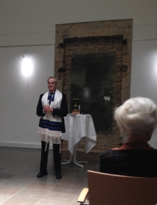 Welcoming the crowd of 70 Jews and non Jews to the service. A Catholic priest and Lutheran pastor were among the worshippers.